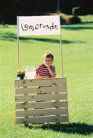 sell lemonade - Boy with Lemonade Stand in Field Stock Photo - Rights-Managed, Code: 700-00047053