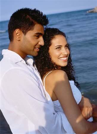 Portrait of Couple Embracing on Beach Stock Photo - Rights-Managed, Code: 700-00047336