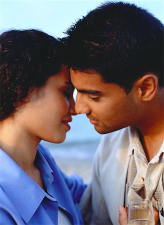 simsearch:600-03456256,k - Close-Up of Couple About to Kiss Outdoors Stock Photo - Rights-Managed, Code: 700-00047349