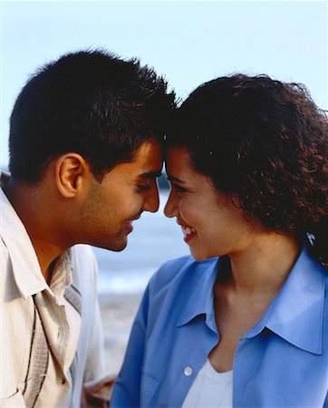 simsearch:600-03456256,k - Close-Up of Couple Face to Face On Beach Stock Photo - Rights-Managed, Code: 700-00047350