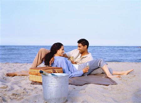 Couple Lying on Beach Having Picnic Stock Photo - Rights-Managed, Code: 700-00047361