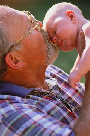 simsearch:700-02199981,k - Grandfather Kissing Baby Foto de stock - Con derechos protegidos, Código: 700-00047416