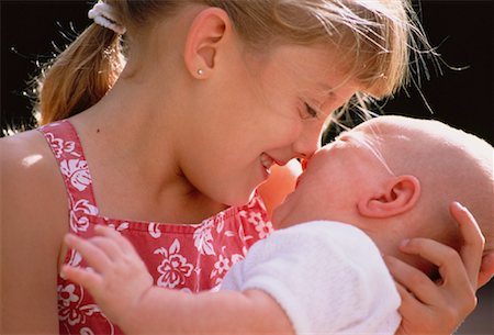 simsearch:700-00047419,k - Girl Holding Baby Stock Photo - Rights-Managed, Code: 700-00047418