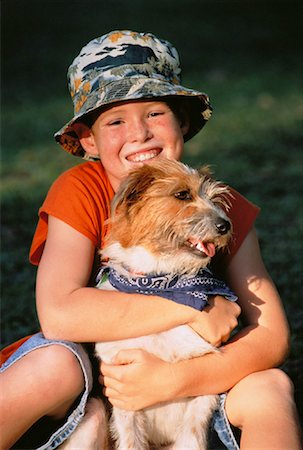 simsearch:700-00350535,k - Portrait of Boy Hugging Dog Outdoors Foto de stock - Direito Controlado, Número: 700-00047576