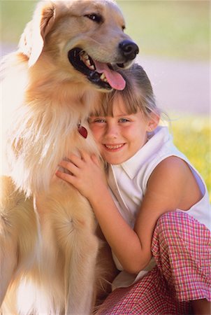 simsearch:700-00098404,k - Portrait of Girl Hugging Dog Outdoors Fotografie stock - Rights-Managed, Codice: 700-00047573