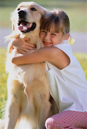 simsearch:700-00098404,k - Portrait of Girl Hugging Dog Outdoors Fotografie stock - Rights-Managed, Codice: 700-00047691