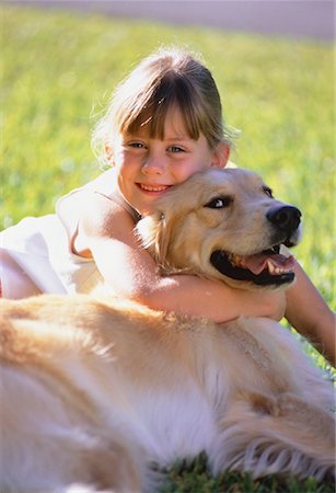simsearch:700-00098404,k - Portrait of Girl Hugging Dog Outdoors Fotografie stock - Rights-Managed, Codice: 700-00047692