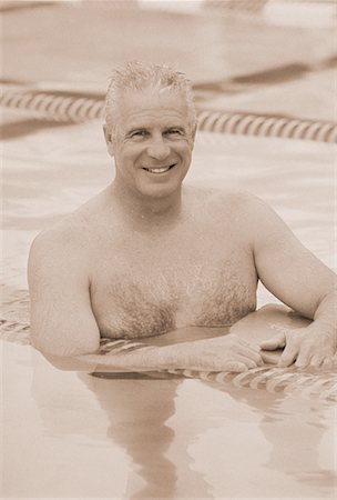 swimming pool people b&w - Portrait of Mature Man in Swimming Pool Stock Photo - Rights-Managed, Code: 700-00047808