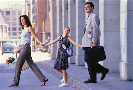 Family Walking on Street Holding Hands Stock Photo - Rights-Managed, Code: 700-00048130