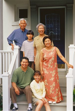 simsearch:700-00048144,k - Portrait of Family Standing on Porch Stock Photo - Rights-Managed, Code: 700-00048144