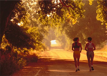 Back View of Women Running Along Road, Boulder, Colorado, USA Stock Photo - Rights-Managed, Code: 700-00048202