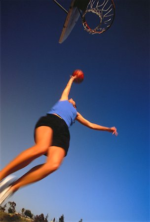 simsearch:700-00032210,k - Woman Playing Basketball Outdoors Stock Photo - Rights-Managed, Code: 700-00048287