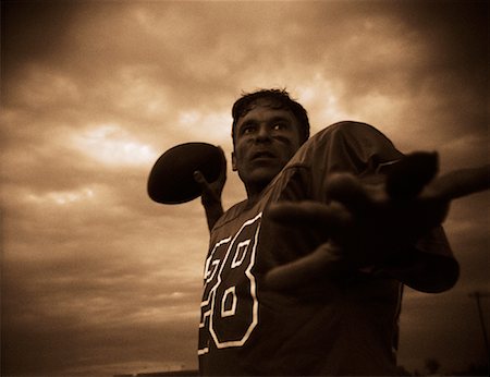 Football Player Throwing Ball Stock Photo - Rights-Managed, Code: 700-00048629