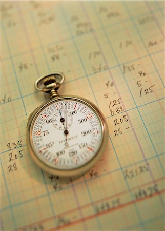 simsearch:700-00165882,k - Close-Up of Stopwatch on Ledger Stock Photo - Rights-Managed, Code: 700-00049098