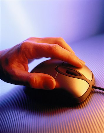Close-Up of Hand and Computer Mouse Stock Photo - Rights-Managed, Code: 700-00040582