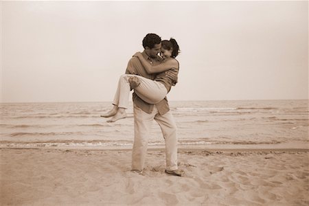 simsearch:700-00046307,k - Man Carrying Woman on Beach Stock Photo - Rights-Managed, Code: 700-00041095