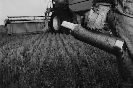 farm picture tractor black and white - Close-Up of Farmer Holding Thermos Stock Photo - Rights-Managed, Code: 700-00041293