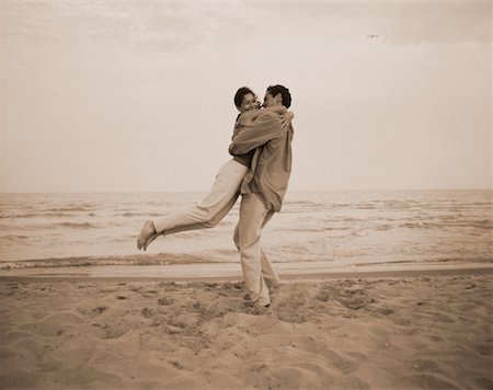 simsearch:700-00046307,k - Couple Embracing on Beach Stock Photo - Rights-Managed, Code: 700-00041347