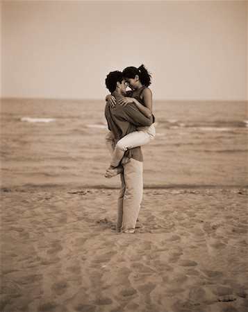 peter griffith - Couple Embracing on Beach Stock Photo - Rights-Managed, Code: 700-00041348