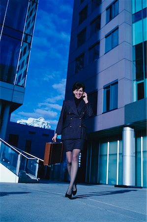 simsearch:700-00064433,k - Businesswoman Using Cell Phone Outdoors Stock Photo - Rights-Managed, Code: 700-00041402