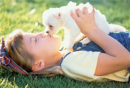 simsearch:700-00095769,k - Girl Kissing Puppy Outdoors Stock Photo - Rights-Managed, Code: 700-00041532