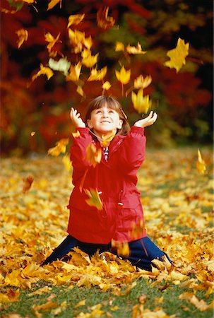 Girl Playing with Leaves in Autumn, Toronto, Ontario, Canada Stock Photo - Rights-Managed, Code: 700-00041712
