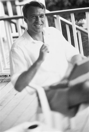 Portrait of Man on Patio with Laptop Computer, Bahamas Stock Photo - Rights-Managed, Code: 700-00041746