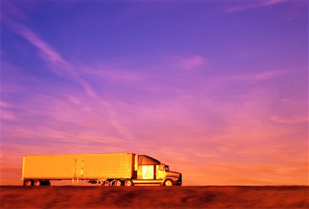side view of a semi truck - Transport Truck on Highway at Sunset Stock Photo - Rights-Managed, Code: 700-00042029