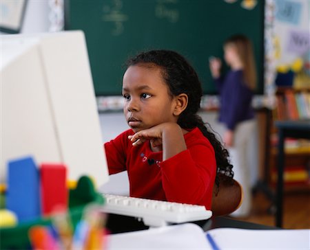 Girl Using Computer in Classroom Stock Photo - Rights-Managed, Code: 700-00042023