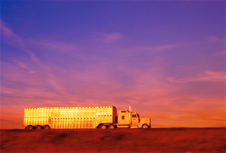 side view of a semi truck - Transport Truck on Highway at Dusk Stock Photo - Rights-Managed, Code: 700-00042030