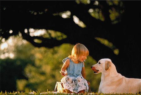 Girl with Dog Outdoors Stock Photo - Rights-Managed, Code: 700-00042366