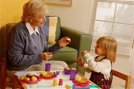 Grandmother and Granddaughter Having Tea Party Stock Photo - Rights-Managed, Code: 700-00042617