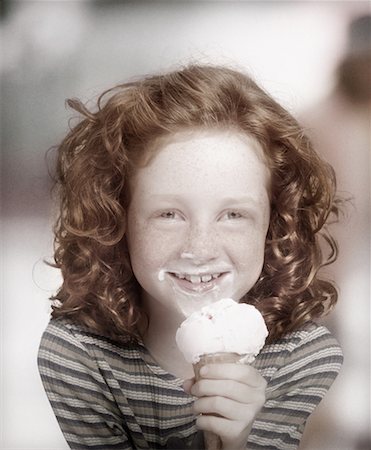 Portrait of Girl Eating Ice Cream Cone Foto de stock - Con derechos protegidos, Código: 700-00042749