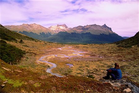 Femme assise en plein air, Tierra del Fuego, Argentine Patagonie Photographie de stock - Rights-Managed, Code: 700-00043009