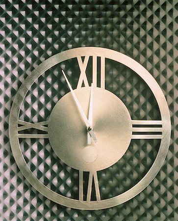 simsearch:700-00165882,k - Clock Roman Grill Wall Clock by Umbra Inc. Stock Photo - Rights-Managed, Code: 700-00043404