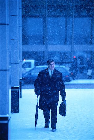 Businessman Walking in Snow Toronto, Ontario, Canada Stock Photo - Rights-Managed, Code: 700-00043582