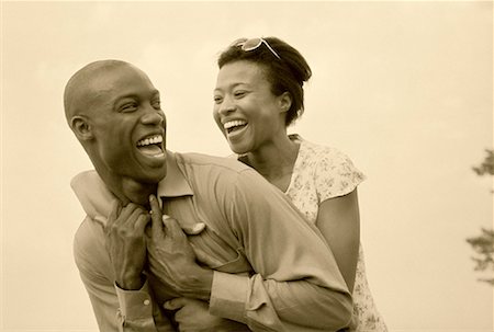 Couple Embracing and Laughing Outdoors Stock Photo - Rights-Managed, Code: 700-00054361