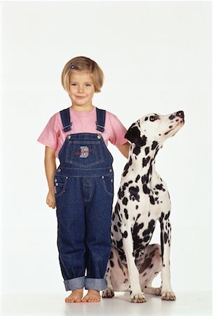 simsearch:700-00098404,k - Portrait of Girl Standing with Dalmatian Fotografie stock - Rights-Managed, Codice: 700-00054399