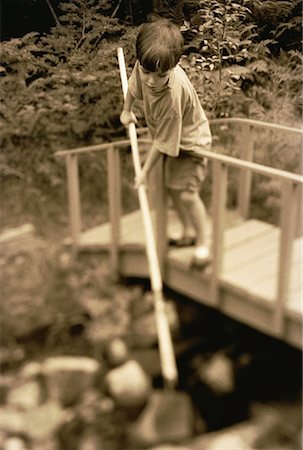 simsearch:700-00044168,k - Boy Standing on Bridge, Using Net in Stream Foto de stock - Con derechos protegidos, Código: 700-00054519