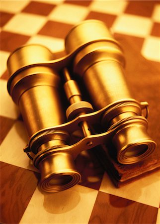 Binoculars and Book on Checkerboard Stock Photo - Rights-Managed, Code: 700-00055207