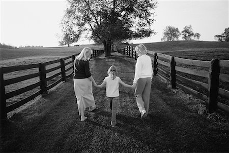 Grandmother, Mother and Daughter Holding Hands, Walking Outdoors Stock Photo - Rights-Managed, Code: 700-00055274