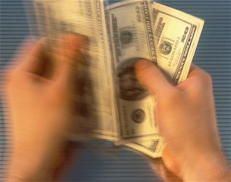 Close-Up of Hands Counting Money Stock Photo - Rights-Managed, Code: 700-00055304