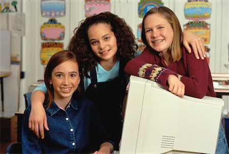 Portrait of Three Girls at Computer in Classroom Stock Photo - Rights-Managed, Code: 700-00055607