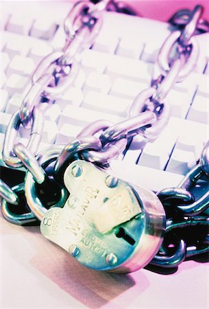 simsearch:600-02833369,k - Padlock and Chain on Computer Keyboard Stock Photo - Rights-Managed, Code: 700-00056169