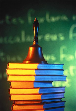 simsearch:700-00070679,k - School Bell on Stack of Books Stock Photo - Rights-Managed, Code: 700-00056277