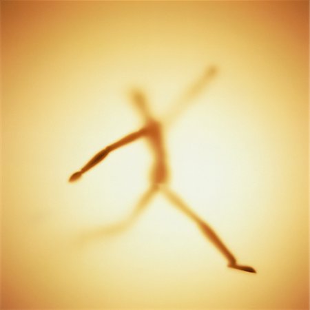 Silhouette of Jumping Figure Stock Photo - Rights-Managed, Code: 700-00056328