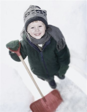 Portrait of Boy with Shovel Outdoors in Winter Stock Photo - Rights-Managed, Code: 700-00056421