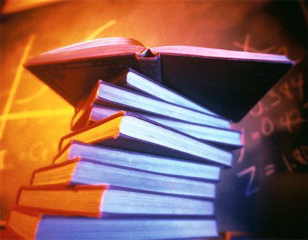 Open Book on Stack of Books with Blackboard Stock Photo - Rights-Managed, Code: 700-00056475