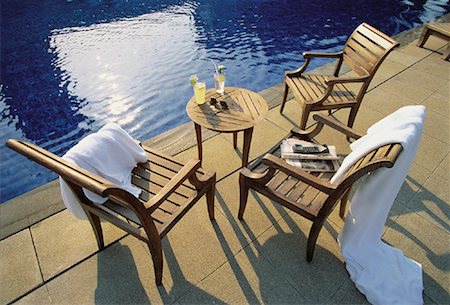 Chairs and Table near Swimming Pool Stock Photo - Rights-Managed, Code: 700-00056756