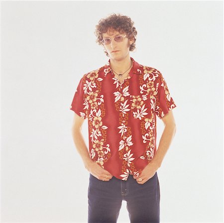 person in hawaiian shirt - Portrait of Man Wearing Hawaiian Shirt and Sunglasses Stock Photo - Rights-Managed, Code: 700-00057543